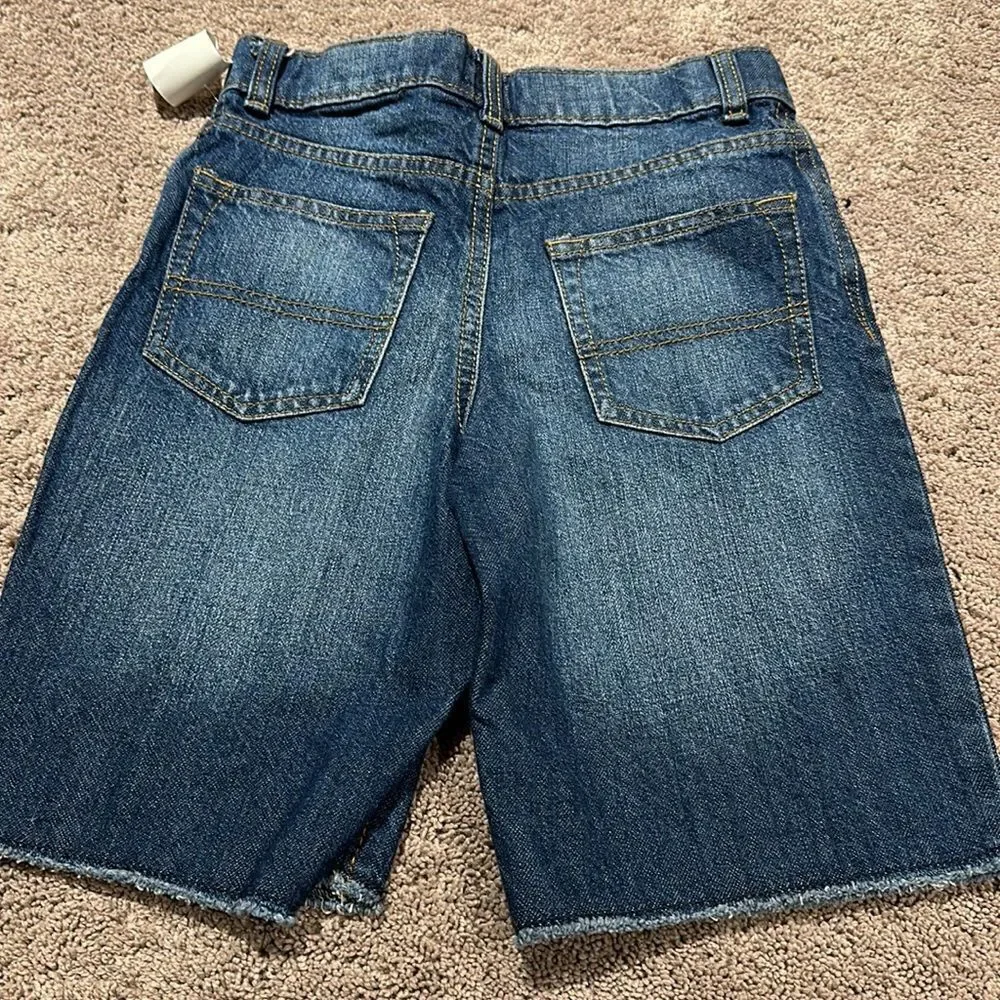 Osh kosh denim shorts! Size 8 easy on! Mild distressing! Longer length!